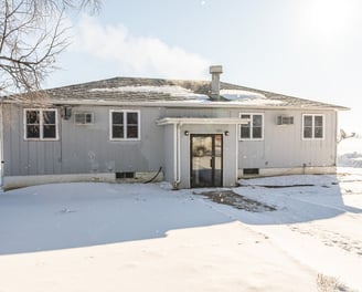 a multifamily complex in a snow blanketed state