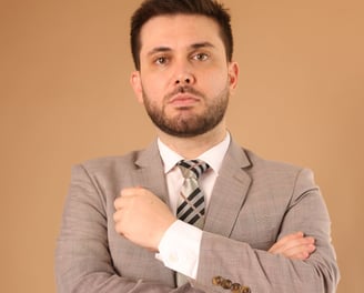 a man in a suit and tie with a tie