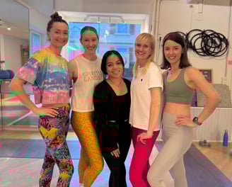 Barre teachers leading low-impact workouts at Joy Movement Studio in Meilen