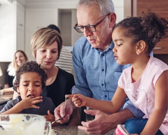 Grandparents & grands baking cookies in the kitchen