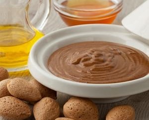 a bowl with nuts and almonds