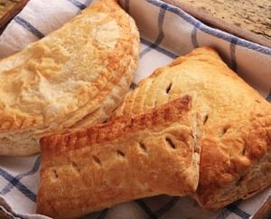 a basket of pastries with a basket of pastries