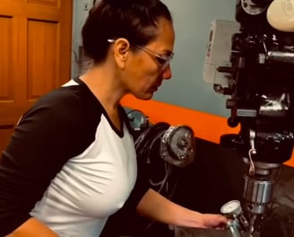 woman operating a mill