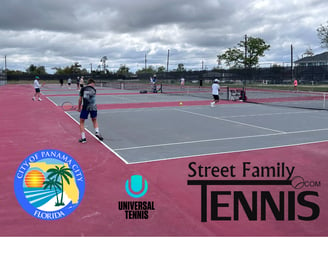 Male tennis players warming up for UTR Tennis Tournament in Panama City, FL.