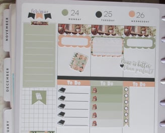 green and peach planner sticker layout in paper planner