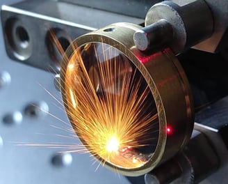 a man is welding a piece of metal