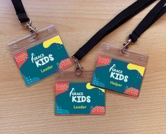 GraceKids lanyard badges for leaders and helpers, featuring a colourful, abstract design.