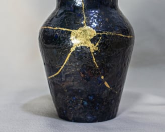 Kintsugi-repaired vase with 24K gold veins, handmade in Amman, Jordan