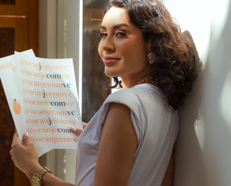 a woman holding a sign that says,'i am a woman who is not