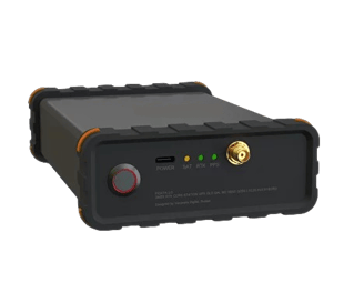 a black and yellow amplifier with a red button