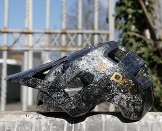 a MTB POC Helmet customized with marbling effect and gold