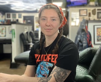 a woman tattoo artist profile picture