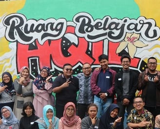 With volunteers and beneficiaries of RBA