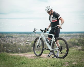 a man presenting his bike