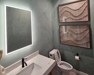 Modern bathroom with a textured limewash finish, creating a sleek and elegant in an Arizona home