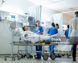 a group of doctors and nurses in a hospital