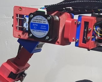 Robot actuator and gripper used for pick and place operations in manufacturing