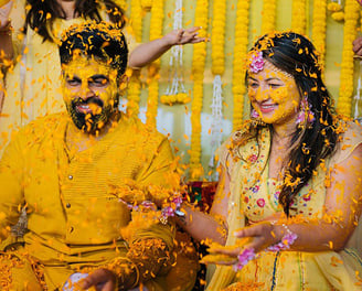 a man and woman in yellow and yellow colored clothes