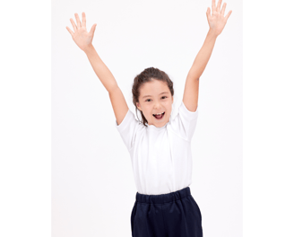 young girl raising her hands excitedly