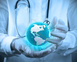 a doctor holding a globe in his hands