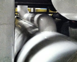 Large-scale commercial thermal insulation installation on industrial HVAC equipment and mechanicals