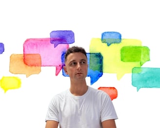 Ross Thompson Life Coach - Group Coaching Surrounded By Speech Bubbles.