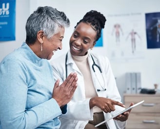 elderly woman with a doctor