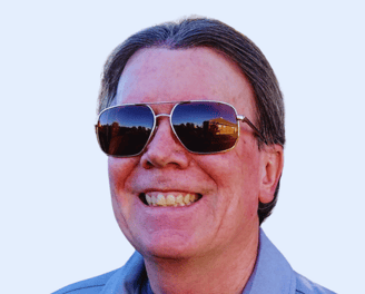 a man wearing sunglasses and sunglasses with a tie