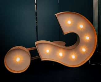 a lighted letter g with a large light up
