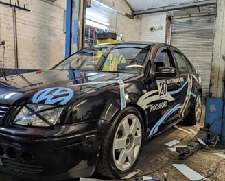 a car with a blue and white paint job on it