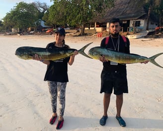 Happy anglers on a Zanzibar fishing charter with Zanzibar Angler's Paradise.