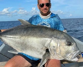 Zanzibar Fishing Trips – client catching a Giant Trevally on a fishing charter