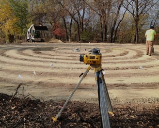 a man standing in a circular maze maze maze