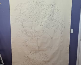 After sewing rod gutters, the linen tapestry is hung to cast the design and draw with soft charcoal pencil.