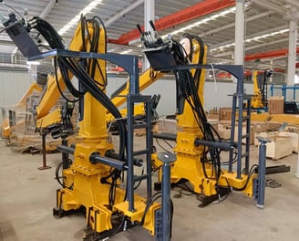 Customer order: Yellow ZM66.2 truck-mounted forestry cranes, pictured at our production facility.