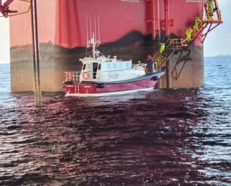 a boat is docked in the water