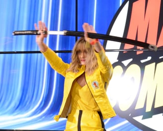 Kill Bill in a yellow jacket and yellow jacket