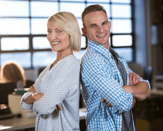 a man and woman standing in a room