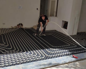 pose de chauffage au sol sur plots à Bruxelles, service proposé par entreprise en construction