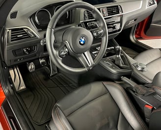 Interior Detailing Image “Deep interior car detailing with steam cleaning and vacuuming of seats"