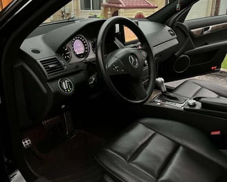 Interior Detailing Image “Deep interior car detailing with steam cleaning and vacuuming of seats"