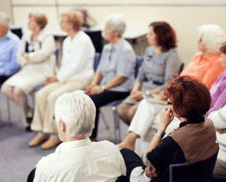 A group of people at a meeting