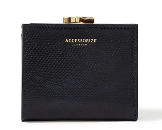 a black purse with a gold clasp and a gold clasp