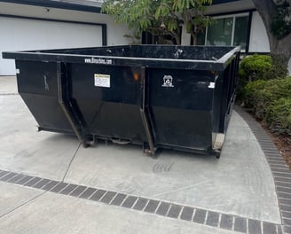 Our 11 cubic yard dumpster getting ready to be filled with household junk.  