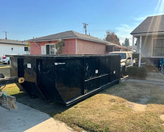 Our 18 cubic yard dumpster accepts construction waste.