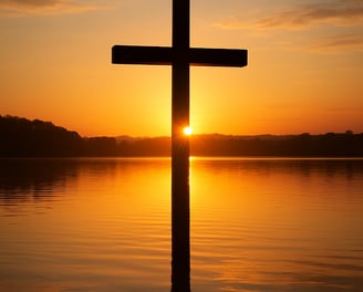 a cross - shaped cross on a lake
