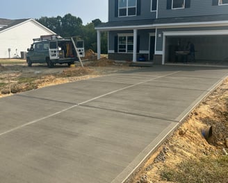 a house with a truck parked in front of it