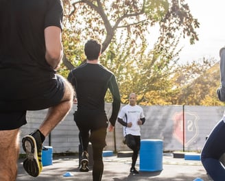 Colleagues working out together and practicing sports