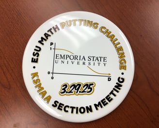 A disc golf putter with the phrase "ESU Math Putting Challenge."