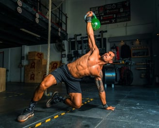 a man doing a kettlebell exercise